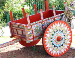 No two ox-carts are the same, each hand built and hand painted